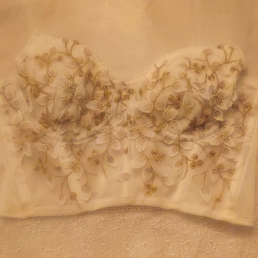 White and tan flower applicade bustier.